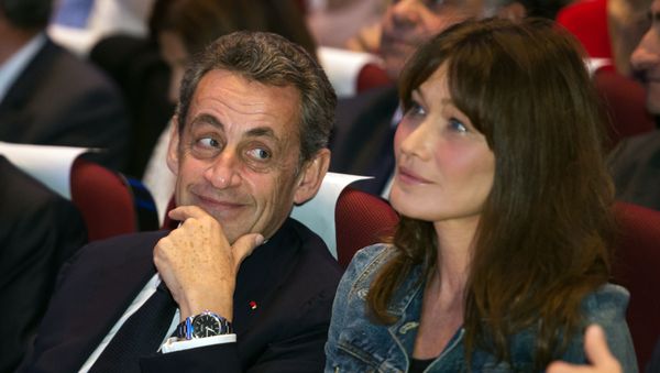Former French President and candidate for the right-wing Les Republicains (LR) party primaries ahead of the 2017 presidential election Nicolas Sarkozy (L) and his wife Carla Bruni look on during a meeting in Toulon, southeastern France, on October 21, 2016. Former French President and candidate for the right-wing Les Republicains (LR) party primaries ahead of the 2017 presidential election Nicolas Sarkozy (L) and his wife Carla Bruni look on during a meeting in Toulon, southeastern France, on October 21, 2016. - Sputnik International