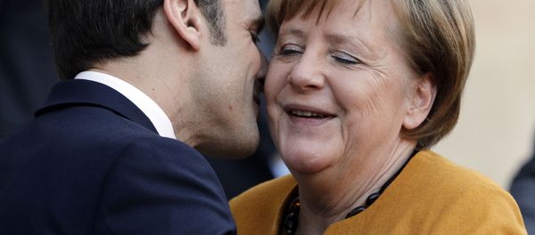French President Emmanuel Macron Kisses German Chancellor Angela Merkel French President Emmanuel Macron Kisses German Chancellor Angela Merkel - Sputnik International