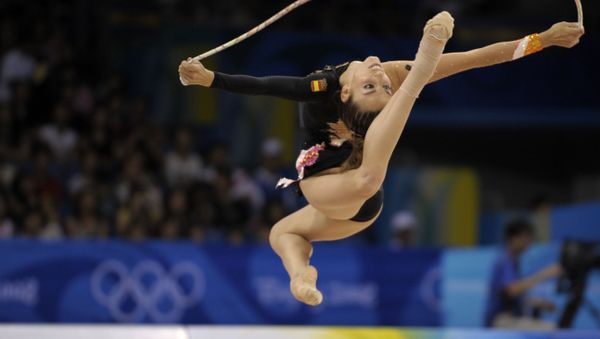 Spanish gymnast Almudena Cid performs with the rope during the rhythmic gymnastics individual at the Beijing 2008 Olympics in Beijing, Saturday, Aug. 23, 2008.  (AP Photo/Odd Andersen) - Sputnik International