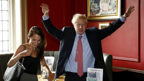 Conservative Party leadership candidate Boris Johnson gestures during a visit to Wetherspoons Metropolitan Bar in London, Wednesday July 10, 2019 Conservative Party leadership candidate Boris Johnson gestures during a visit to Wetherspoons Metropolitan Bar in London, Wednesday July 10, 2019 - Sputnik International