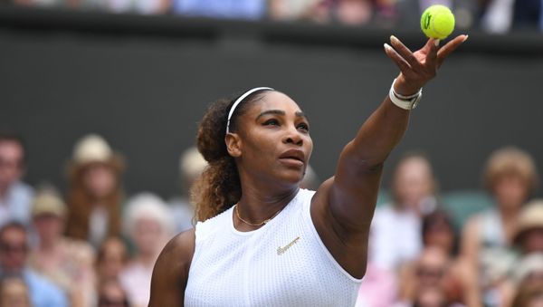 US player Serena Williams serves against Romania's Simona Halep during their women's singles final on day twelve of the 2019 Wimbledon Championships - Sputnik International