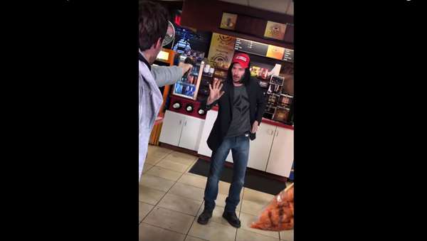 A still from Keanu Reeves Stops A ROBBERY! deepfake video - Sputnik International