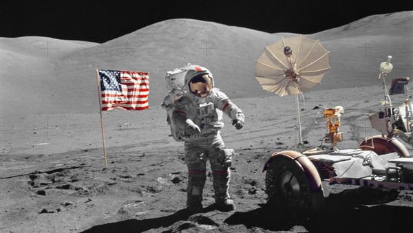 This December 13, 1972 image courtesy of NASA shows Astronaut Eugene A. Cernan, mission commander, walking toward the Lunar Roving Vehicle (LRV) during extravehicular activity (EVA) at the Taurus-Littrow landing site of NASA's sixth and final Apollo lunar landing mission - Sputnik International