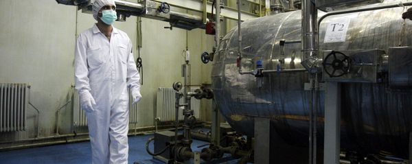In this Saturday, Feb. 3, 2007 photo, an Iranian technician walks through the Uranium Conversion Facility just outside the city of Isfahan 255 miles (410 kilometers) south of the capital Tehran, Iran In this Saturday, Feb. 3, 2007 photo, an Iranian technician walks through the Uranium Conversion Facility just outside the city of Isfahan 255 miles (410 kilometers) south of the capital Tehran, Iran - Sputnik International
