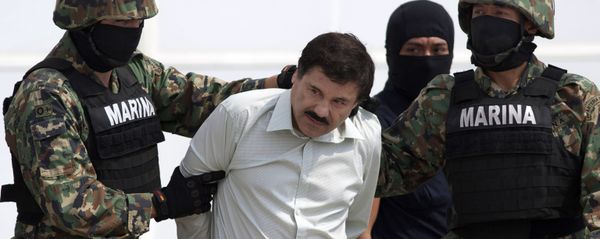 In this Feb. 22, 2014 file photo, Joaquin El Chapo Guzman, center, is escorted to a helicopter in handcuffs by Mexican navy marines at a hanger in Mexico City, after he was captured overnight in the beach resort town of Mazatlan In this Feb. 22, 2014 file photo, Joaquin El Chapo Guzman, center, is escorted to a helicopter in handcuffs by Mexican navy marines at a hanger in Mexico City, after he was captured overnight in the beach resort town of Mazatlan - Sputnik International