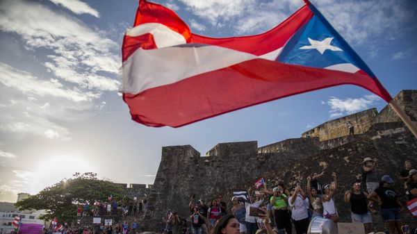 Demonstrators march against governor Ricardo Rosello, in San Juan, Puerto Rico, Wednesday, July 17, 2019. Protesters are demanding Rossello step down for his involvement in a private chat in which he used profanities to describe an ex-New York City councilwoman and a federal control board overseeing the island's finance. - Sputnik International