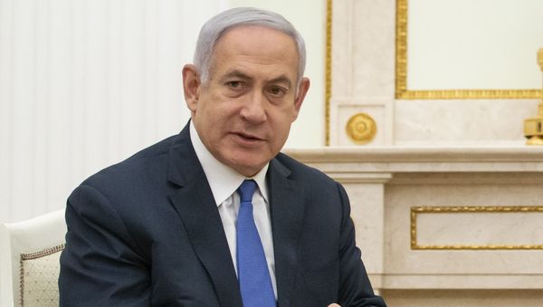 Israeli Prime Minister Benjamin Netanyahu gestures while speaking to Russian President Vladimir Putin during their meeting in the Kremlin in Moscow, Russia, Thursday, April 4, 2019 - Sputnik International