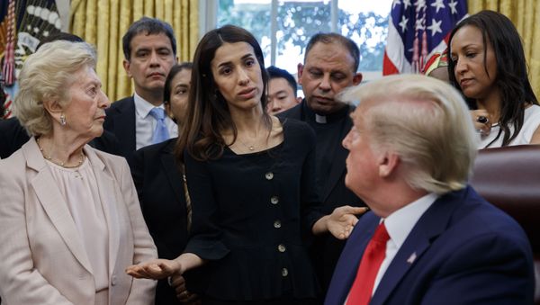 President Donald Trump listens to Nobel Peace Prize winner Nadia Murad, a Yazidi from Iraq, center, as he meets with survivors of religious persecution in the Oval Office of the White House on Wednesday, July 17, 2019, in Washington. - Sputnik International