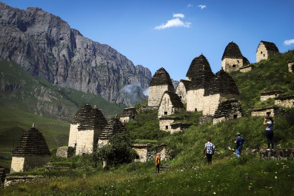 Tourists near necropolis in the ‘City of the Dead’ in Russia’s republic of North Ossetia Tourists near necropolis in the ‘City of the Dead’ in Russia’s republic of North Ossetia - Sputnik International