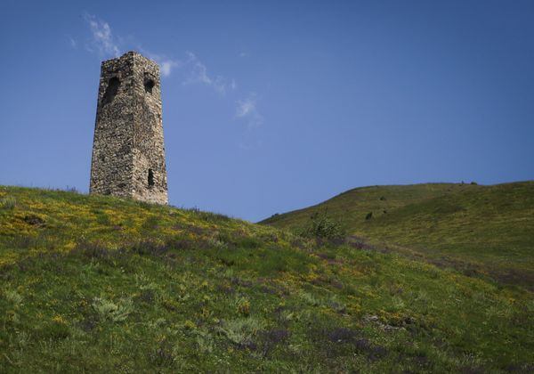 An ancient tower is pictured near the City of the Dead, a medieval Alanian burial site and a local branch of the North Ossetian National Museum near the village of Dargavs, Russia's Republic of North Ossetia - Alania. An ancient tower is pictured near the City of the Dead, a medieval Alanian burial site and a local branch of the North Ossetian National Museum near the village of Dargavs, Russia's Republic of North Ossetia - Alania. - Sputnik International
