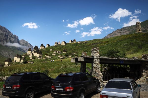 Cars parked near necropolis on the territory of the ‘City of the Dead’ in Russia’s republic of North Ossetia Cars parked near necropolis on the territory of the ‘City of the Dead’ in Russia’s republic of North Ossetia - Sputnik International