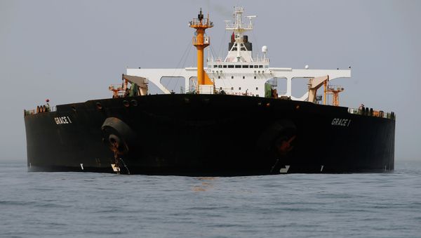 Iranian oil tanker Grace 1 sits anchored after it was seized earlier this month by British Royal Marines off the coast of the British Mediterranean territory on suspicion of violating sanctions against Syria, in the Strait of Gibraltar, southern Spain July 20, 2019 - Sputnik International
