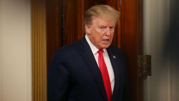 U.S. President Donald Trump enters the room to participate in the Pledge to America's Workers - One year Celebration event in the State Dining Room of the White House in Washington, U.S., July 25, 2019 - Sputnik International