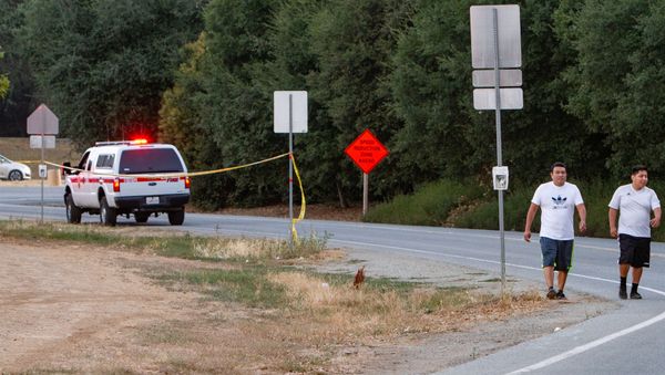 People leave the  scene of a mass shooting during the Gilroy Garlic Festival in Gilroy, California, U.S. July 28, 2019 - Sputnik International