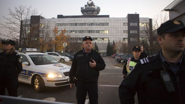 Police secure the building of state TV as members and supporters of of Zivi Zid political party rally in Zagreb, Croatia, Friday, Nov. 6, 2015. - Sputnik International