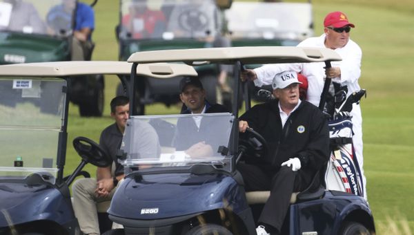US President Donald Trump rides a golf buggy, at Turnberry golf club, in Turnberry, Scotland US President Donald Trump rides a golf buggy, at Turnberry golf club, in Turnberry, Scotland - Sputnik International