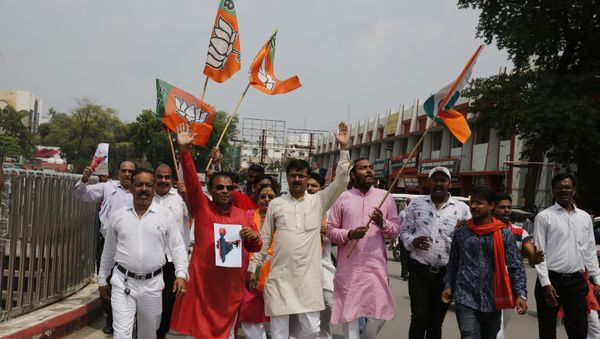 India's ruling Bharatiya Janata Party (BJP) supporters celebrate government revoking disputed Kashmir's special status in Prayagraj, India, Monday, Aug. 5, 2019 India's ruling Bharatiya Janata Party (BJP) supporters celebrate government revoking disputed Kashmir's special status in Prayagraj, India, Monday, Aug. 5, 2019 - Sputnik International