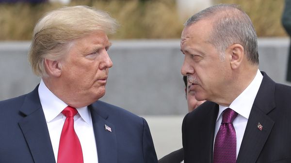 U.S. President Donald Trump, left, talks to Turkish President Recep Tayyip Erdogan, right, as they tour the new NATO headquarters in Brussels, Belgium, Wednesday, July 11, 2018. NATO countries' heads of states and governments gather in Brussels for a two-day meeting.  - Sputnik International