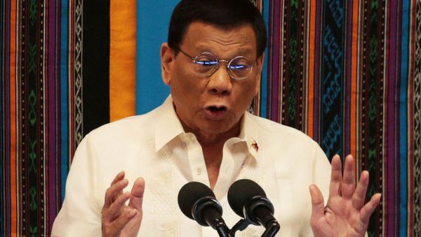 Philippine President Rodrigo Duterte gestures during his fourth State of the Nation Address at the Philippine Congress in Quezon City, Metro Manila, Philippines 22 July 2019 Philippine President Rodrigo Duterte gestures during his fourth State of the Nation Address at the Philippine Congress in Quezon City, Metro Manila, Philippines 22 July 2019 - Sputnik International