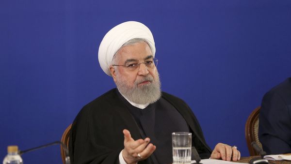 In this photo released by the official website of the office of the Iranian Presidency, President Hassan Rouhani speaks in a meeting with Foreign Minister Mohammad Javad Zarif and the country's senior diplomats in Tehran, Iran, Tuesday, Aug. 6, 2019 - Sputnik International