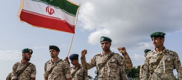 Iranian servicemen react at the first stage of the international competition for professional training Marine landing 2019 at the Khmelevka firing ground on the Baltic Sea coast in Kaliningrad Region, Russia. - Sputnik International