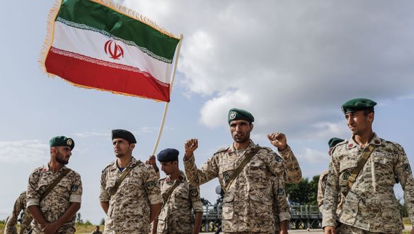 Iranian servicemen react at the first stage of the international competition for professional training Marine landing 2019 at the Khmelevka firing ground on the Baltic Sea coast in Kaliningrad Region, Russia. - Sputnik International