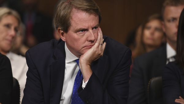 White House counsel Don McGahn listens as Supreme court nominee Brett Kavanaugh testifies before the Senate Judiciary Committee on Capitol Hill in Washington, Thursday, Sept. 27, 2018. - Sputnik International