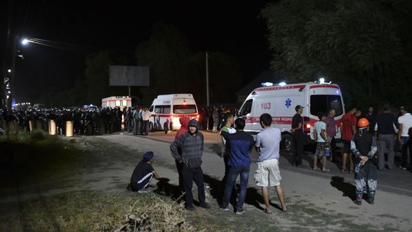 Ambulances stand next to Kyrgyzstan's ex-president Almazbek Atambayev's residence in the village of Koi-Tash, about 20 kilometers (12 miles) south of the capital, Bishkek, Kyrgyzstan, Wednesday, Aug. 7, 2019 - Sputnik International