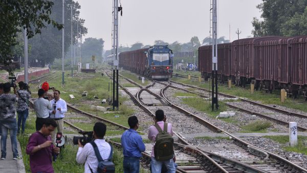 Journalists wait by the station as the Samjhauta Express, a train that runs between Delhi in India and Lahore in Pakistan, arrives in Attari, a town along the border with Pakistan, in the northern Indian state of Punjab, Thursday, Aug. 8, 2019 - Sputnik International