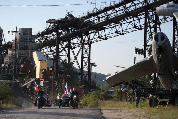 Putin riding the Ural motorbike in Crimea's Sevastopol. - Sputnik International
