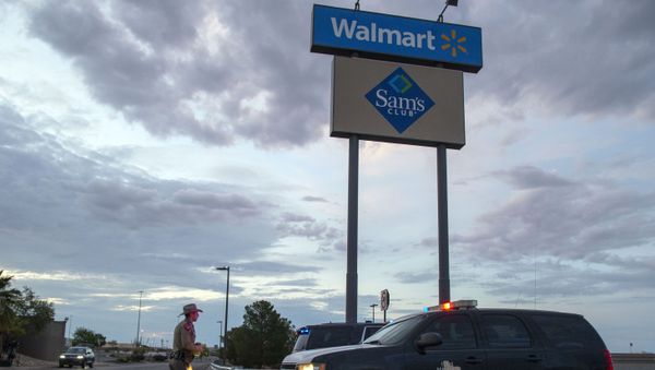 FILE - In this Aug. 4, 2019, file photo a Texas State Trooper walks back to his car while providing security outside the Walmart store in the aftermath of a mass shooting in El Paso, Texas. Like most retailers, Walmart is accustomed to the everyday dealings of shoplifters. Now, it’s confronting a bigger threat: active shooters. Days after a man opened fire at one of its stores in El Paso and left several dead, the nation’s largest retailer is faced with how to make its workers and customers feel safe. FILE - In this Aug. 4, 2019, file photo a Texas State Trooper walks back to his car while providing security outside the Walmart store in the aftermath of a mass shooting in El Paso, Texas. Like most retailers, Walmart is accustomed to the everyday dealings of shoplifters. Now, it’s confronting a bigger threat: active shooters. Days after a man opened fire at one of its stores in El Paso and left several dead, the nation’s largest retailer is faced with how to make its workers and customers feel safe. - Sputnik International
