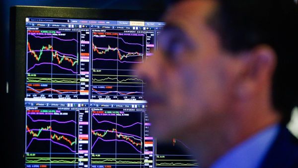 A trader looks at screens as he works on the floor at the New York Stock Exchange (NYSE) in New York - Sputnik International