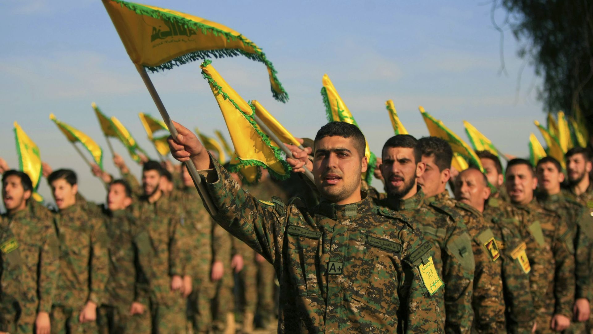 Hezbollah fighters hold flags as they attend the memorial of their slain leader Sheik Abbas al-Mousawi, who was killed by an Israeli airstrike in 1992 Hezbollah fighters hold flags as they attend the memorial of their slain leader Sheik Abbas al-Mousawi, who was killed by an Israeli airstrike in 1992 - Sputnik International, 1920, 08.06.2024