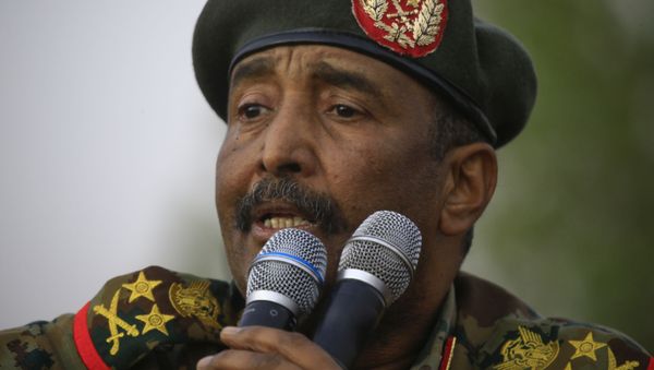  In this file photo taken on June 29, 2019 General Abdel Fattah al-Burhan, the head of Sudan's ruling military council, addresses the crowd in Khartoum's twin city of Omdurman. - Sputnik International