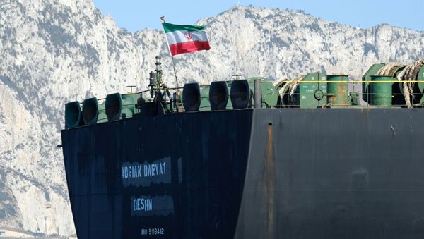 An Iranian flag flutters on board the Adrian Darya oil tanker, formerly known as Grace 1, off the coast of Gibraltar on August 18, 2019. - Sputnik International