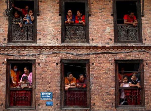 People observe the Nil Barahi mask dance festival, an annual event during which dancers perform while posing as various deities that people worship to seek blessings, in Bode, Nepal August 20, 2019.  - Sputnik International
