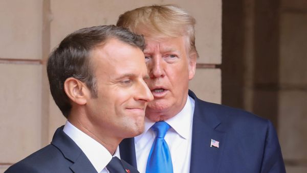 FILE PHOTO: French President Emmanuel Macron speaks with US President Donald Trump on the sidelines of commemorations marking the 75th anniversary of the World War II D-Day landings in Normandy, France, 6 June 2019 FILE PHOTO: French President Emmanuel Macron speaks with US President Donald Trump on the sidelines of commemorations marking the 75th anniversary of the World War II D-Day landings in Normandy, France, 6 June 2019 - Sputnik International