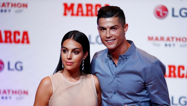 Soccer Football - Cristiano Ronaldo receives the MARCA Legend award - Reina Victoria Theater, Madrid, Spain - July 29, 2019 Cristiano Ronaldo poses with partner Georgina Rodriguez and the MARCA Legend award Soccer Football - Cristiano Ronaldo receives the MARCA Legend award - Reina Victoria Theater, Madrid, Spain - July 29, 2019 Cristiano Ronaldo poses with partner Georgina Rodriguez and the MARCA Legend award - Sputnik International