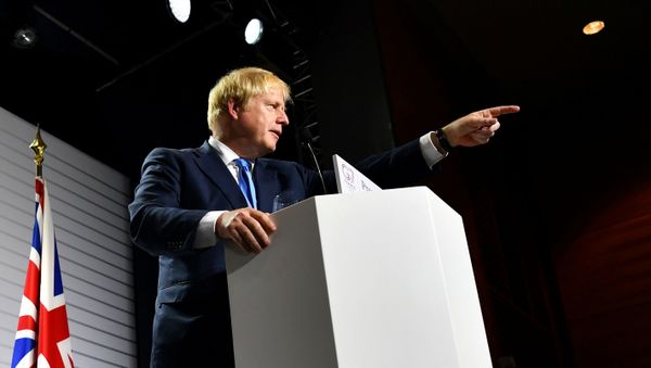 Britain's Prime Minister Boris Johnson gestures during a news conference at the end of the G7 summit in Biarritz, France, August 26, 2019 - Sputnik International