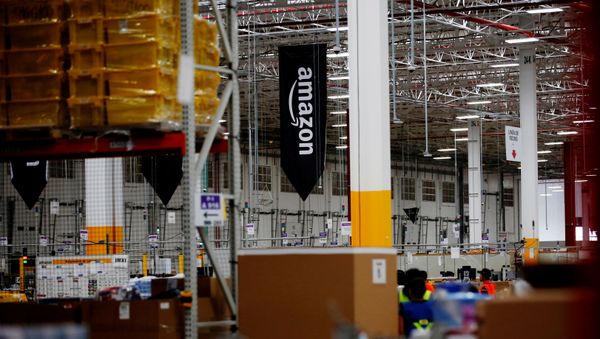  The logo of Amazon is seen at their new Amazon warehouse during its opening announcement on the outskirts of Mexico City, Mexico July 30, 2019 - Sputnik International