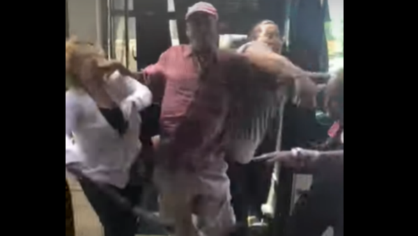 Elderly Commuter Beaten With Own Cane After Brawl Erupts on US Bus - Sputnik International