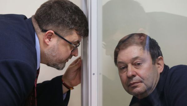 RIA Novosti Ukraine news portal head Kirill Vyshinsky, right, listens to his attorney Andriy Domansky as the Kherson Court of Appeal considers an appeal on extending his arrest in Kherson, Ukraine. On January 31, the Kherson Appeal Court refused to uphold the appeal by the defense of Kirill Vyshinsky against the extension of his arrest - Sputnik International