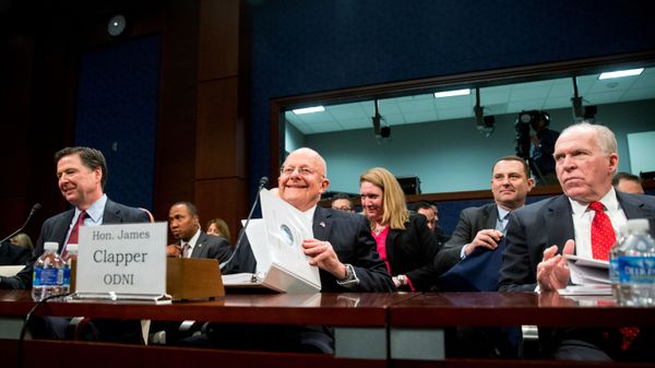 From left, then-FBI Director James Comey, then-Director of National Intelligence James Clapper, and then-CIA Director John Brennan arrive at a House Intelligence Committee hearing on world wide threats on Capitol Hill in Washington, Thursday, Feb. 25, 2016. - Sputnik International