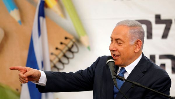 Israeli Prime Minister Benjamin Netanyahu gestures as he speaks during a ceremony opening the school year in the Jewish settlement of Elkana in the Israeli-occupied West Bank September 1, 2019. Israeli Prime Minister Benjamin Netanyahu gestures as he speaks during a ceremony opening the school year in the Jewish settlement of Elkana in the Israeli-occupied West Bank September 1, 2019. - Sputnik International