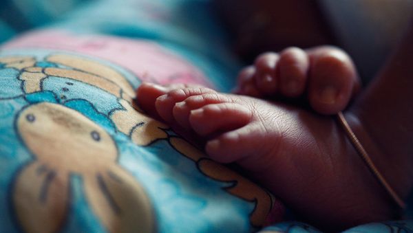 A baby is born with a need to be loved and never outgrows it. ~ Frank A Clark - Sputnik International