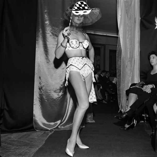 Picture released in October 1961 of a Harlequin model showcasing lingerie by the French brand Charmereine in Paris. Picture released in October 1961 of a Harlequin model showcasing lingerie by the French brand Charmereine in Paris. - Sputnik International