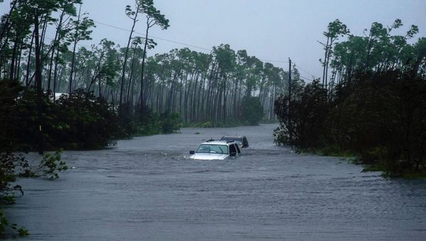 Cars sit submerged in water from Hurricane Dorian in Freeport, Bahamas, Tuesday, Sept. 3, 2019. Dorian is beginning to inch northwestward after being stationary over the Bahamas, where its relentless winds have caused catastrophic damage and flooding.(AP Photo/Ramon Espinosa) - Sputnik International