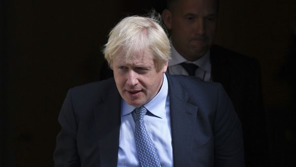 Britain's Prime Minister Boris Johnson leaves 10 Downing Street, London, for the House of Commons to attend the weekly Prime Minister's question time, 4 September 2019 - Sputnik International