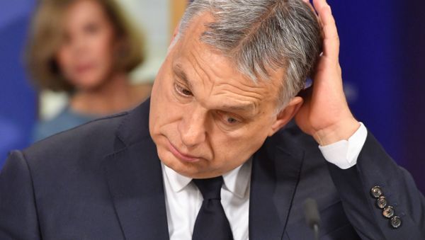 Hungary's Prime Minister Victor Orban addresses a press conference at the end of a European People's Party (EPP) meeting at the European Parliament in Brussels on March 20, 2019 - Sputnik International