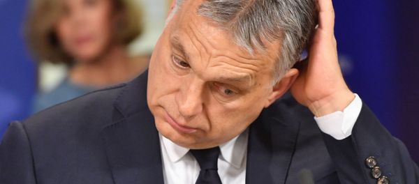 Hungary's Prime Minister Victor Orban addresses a press conference at the end of a European People's Party (EPP) meeting at the European Parliament in Brussels on March 20, 2019 Hungary's Prime Minister Victor Orban addresses a press conference at the end of a European People's Party (EPP) meeting at the European Parliament in Brussels on March 20, 2019 - Sputnik International